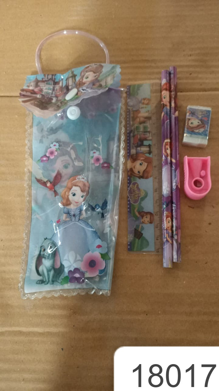 A Sofia the First themed stationery set, including a clear pouch, pencils, ruler, eraser, and sharpener, on a brown surface.