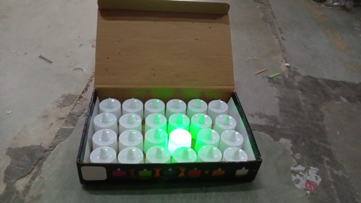 Smokeless green tealights emitting a warm, inviting glow for any occasion.