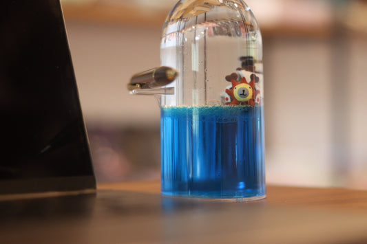 One Piece Straw Hat Pirates Pirate Ship in Round Liquid Motion Bottle Showpiece | Onebest