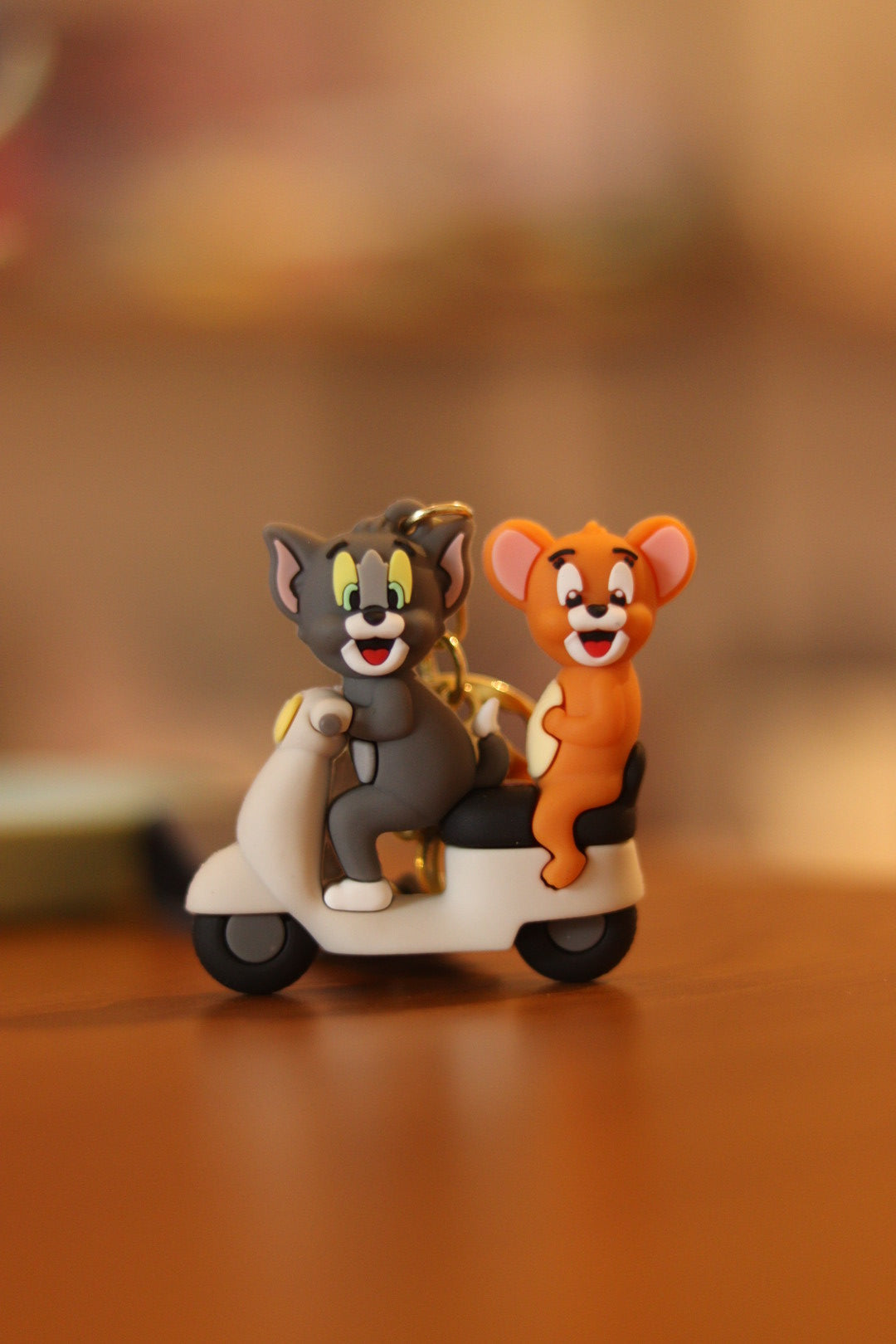 Tom & Jerry on Scooty or Bike Silicone Keychain - Cute Cartoon Style for Bags, Bikes & Gifts | Onebest