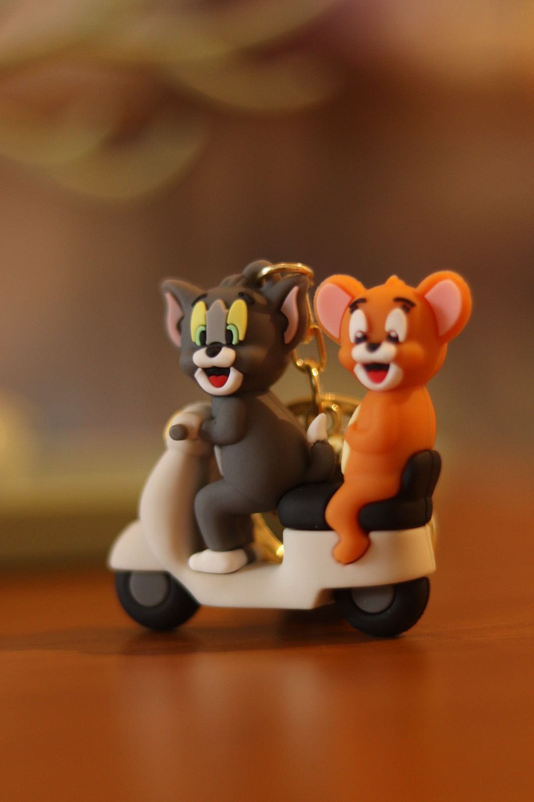Tom & Jerry on Scooty or Bike Silicone Keychain - Cute Cartoon Style for Bags, Bikes & Gifts | Onebest