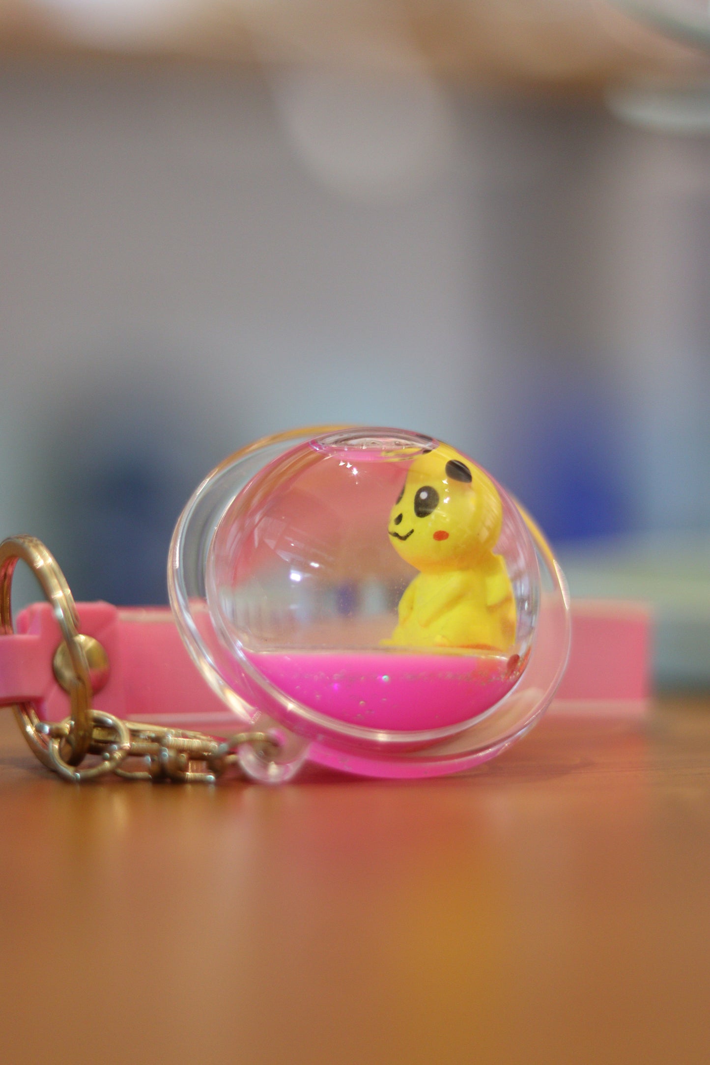 Pikachu Liquid Ball Keychain – Cute Transparent Sphere Charm with Pink Floating Liquid | Acrylic Pokémon Key Ring with Strap for Bags & Gifts | Onebest ⚡💛