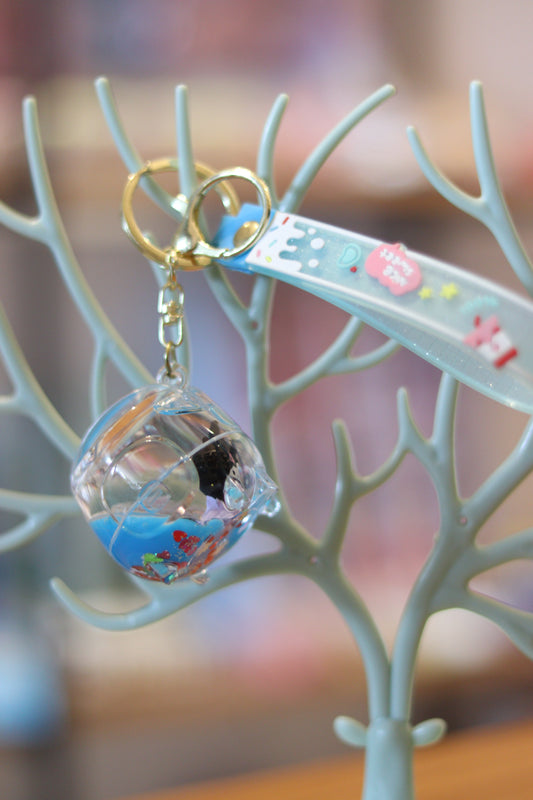 Kuromi Liquid Handbag Keychain – Mini Transparent Purse Charm with Floating Glitter & Blue Liquid | Cute Acrylic Kuromi Key Ring for Bags & Gifts | Onebest 💜👜