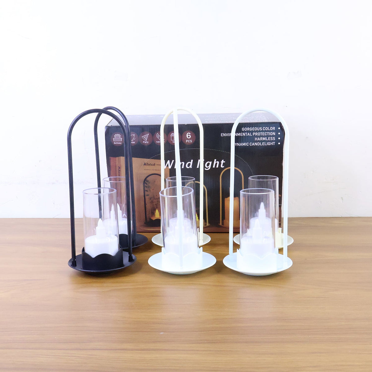 Set of 6 LED wind lanterns glowing softly in a contemporary home décor setting