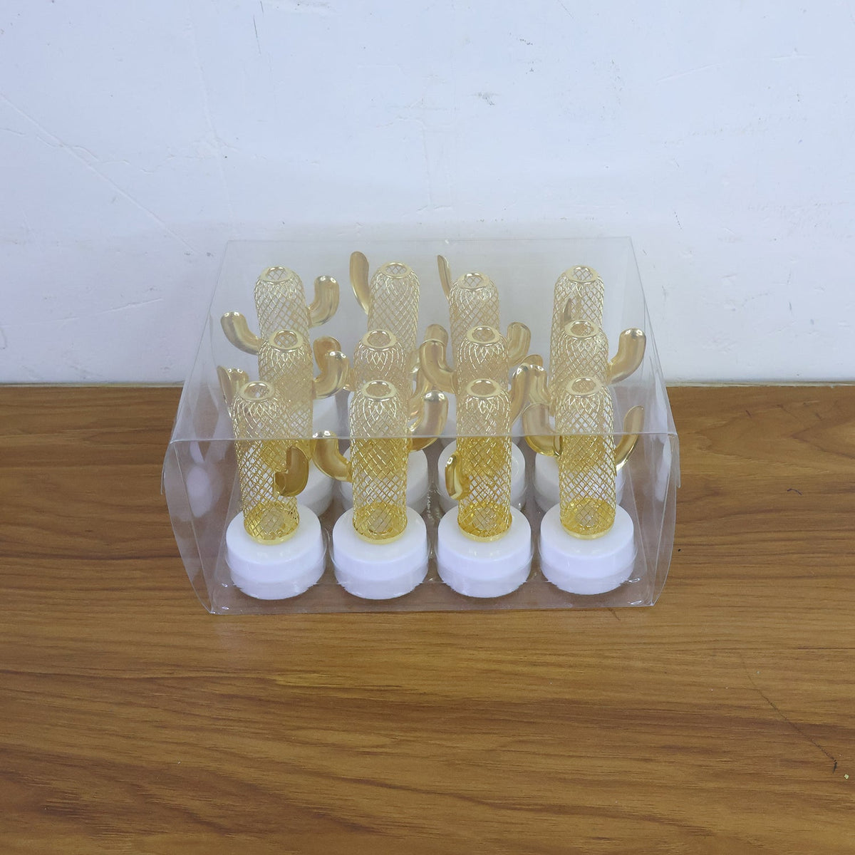 Decorative cactus shaped flameless LED candles lit up adding ambient lighting to a setting
