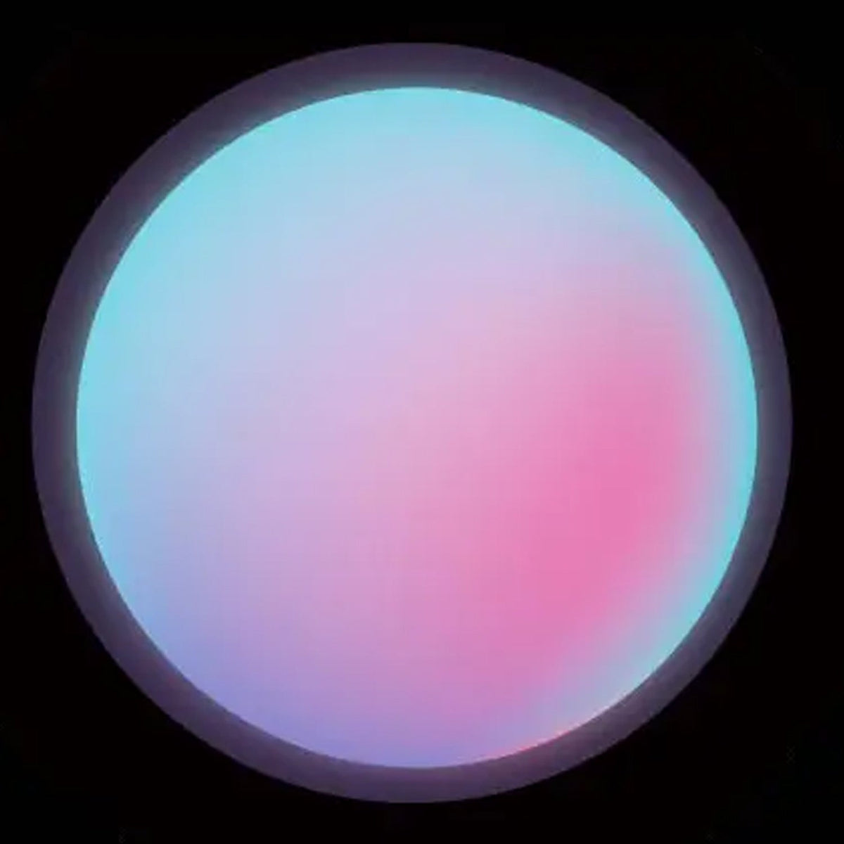 A circular projection of a smooth gradient transitioning from light blue to pink and purple.
