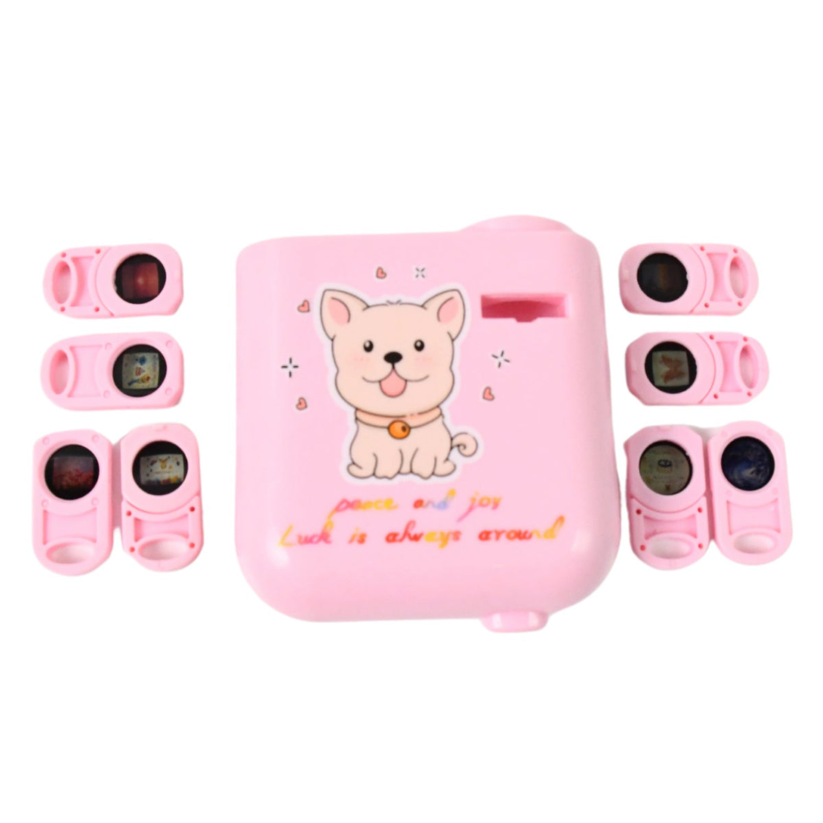 The pink puppy projector and six pink slide cartridges are neatly arranged on a plain white background.