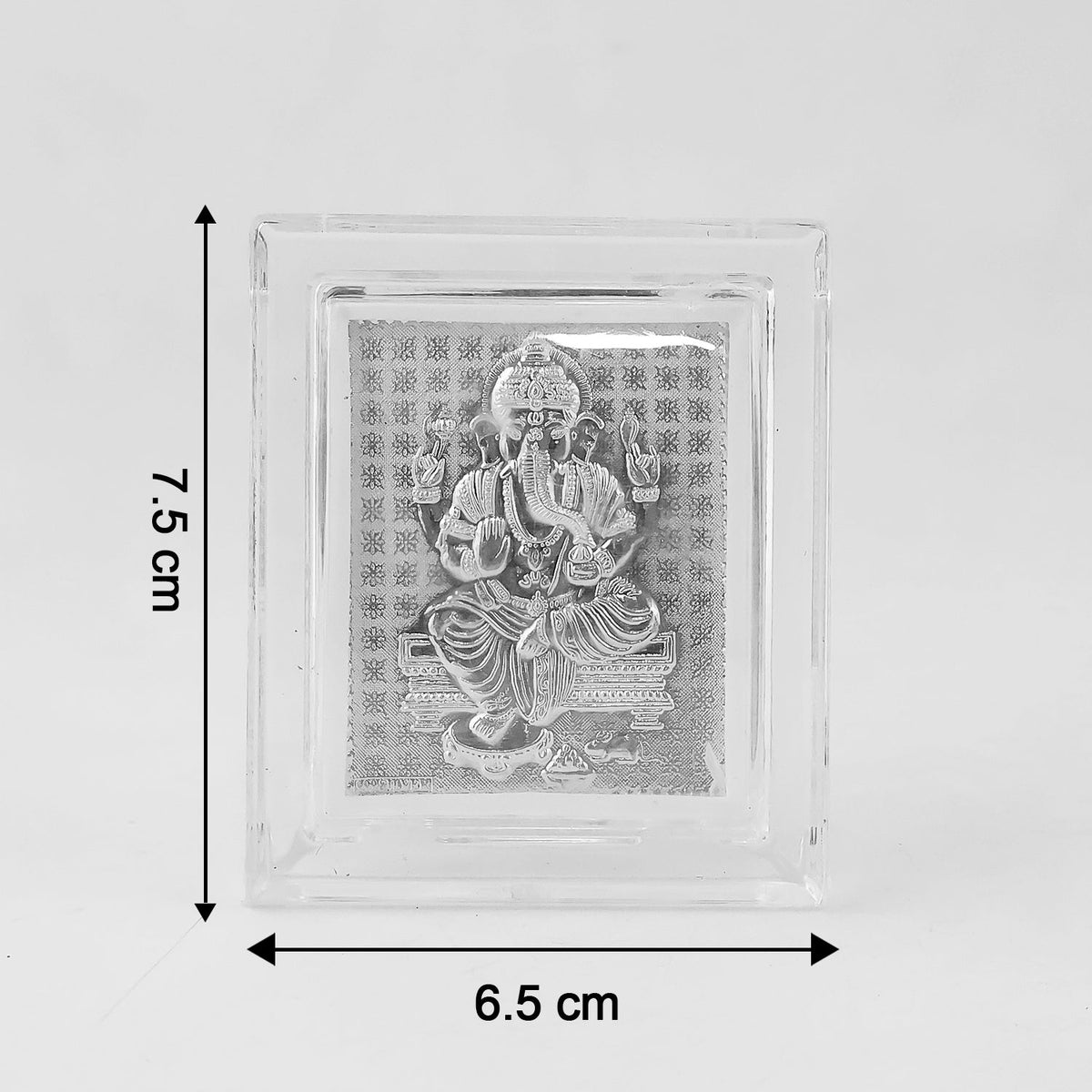 Silver-plated Ganesha idol in an acrylic frame on a white background, with dimensions 7.5 cm height and 6.5 cm width.