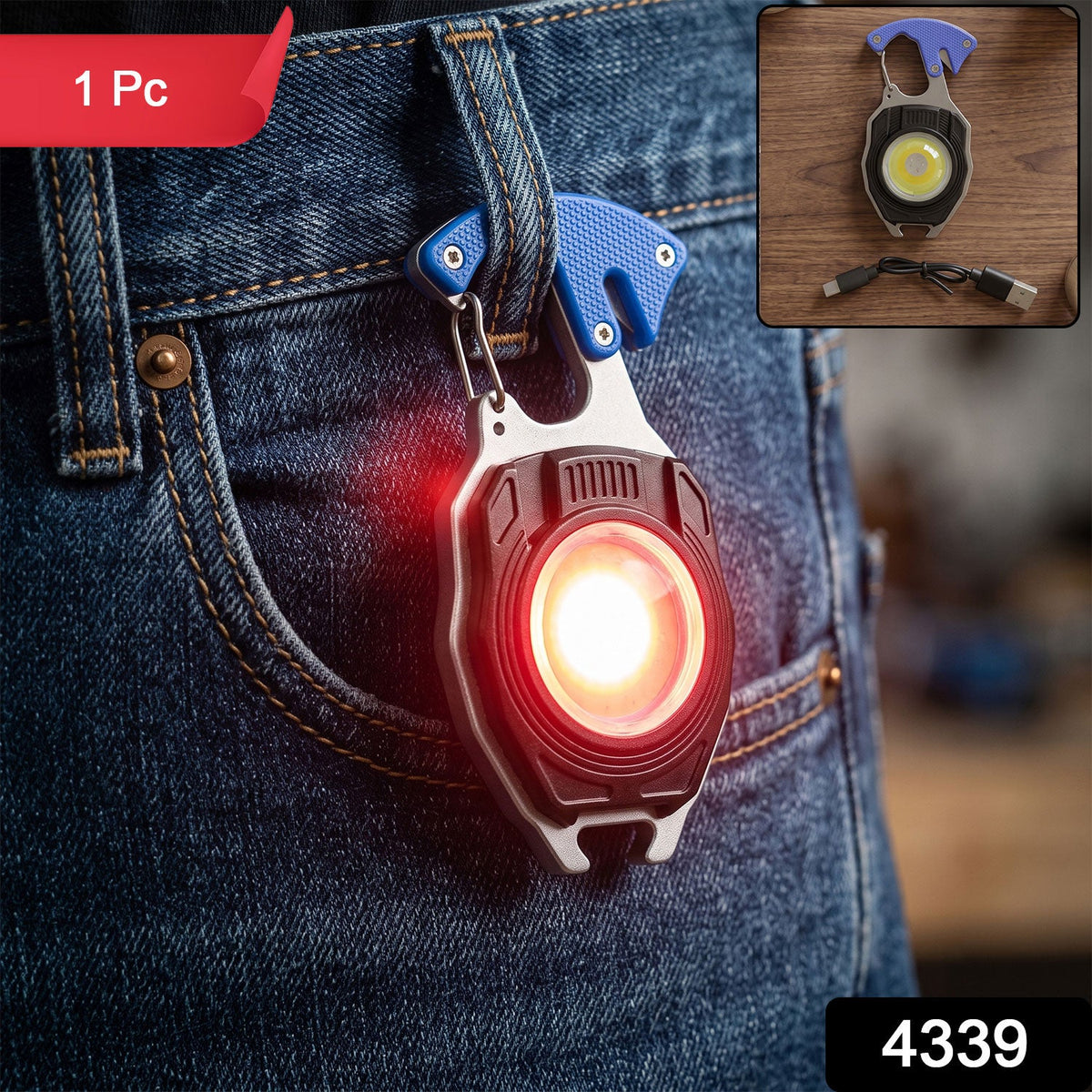 A black and silver multifunction keychain light with a blue clip hangs from a jean belt loop, emitting a bright red light,
