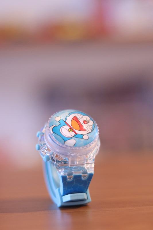 Doraemon 360° Rotating Kids Digital Watch with Light & Music | Time & Date Display | Onebest