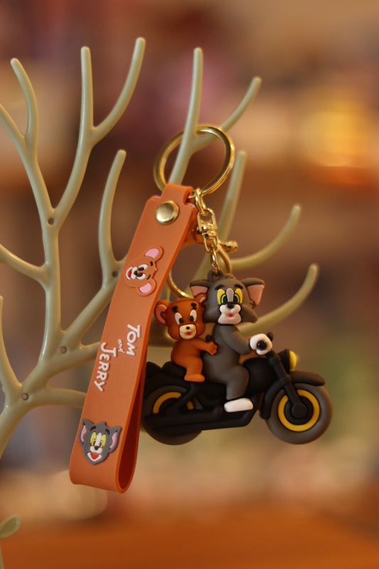 Tom & Jerry on Scooty or Bike Silicone Keychain - Cute Cartoon Style for Bags, Bikes & Gifts | Onebest
