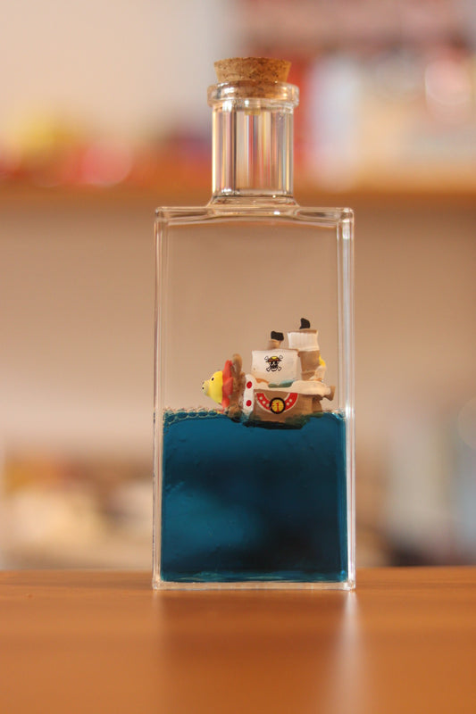 One Piece Pirate Ship in a Square Bottle - Luffy & Straw Hat Pirates in Liquid Drift Bottle | Onebest