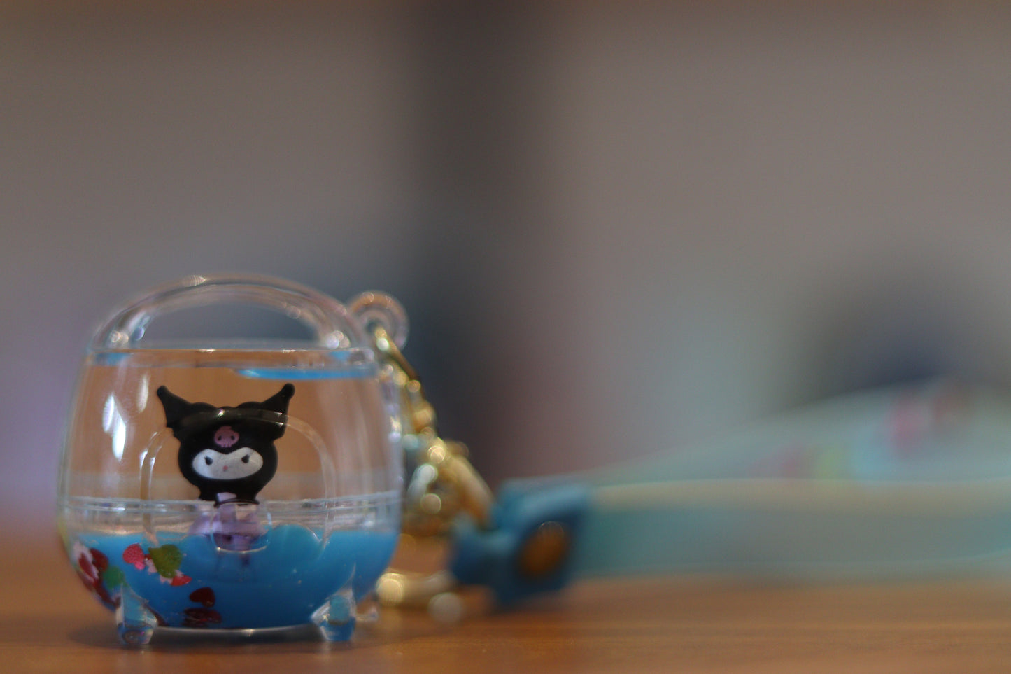 Kuromi Liquid Handbag Keychain – Mini Transparent Purse Charm with Floating Glitter & Blue Liquid | Cute Acrylic Kuromi Key Ring for Bags & Gifts | Onebest 💜👜