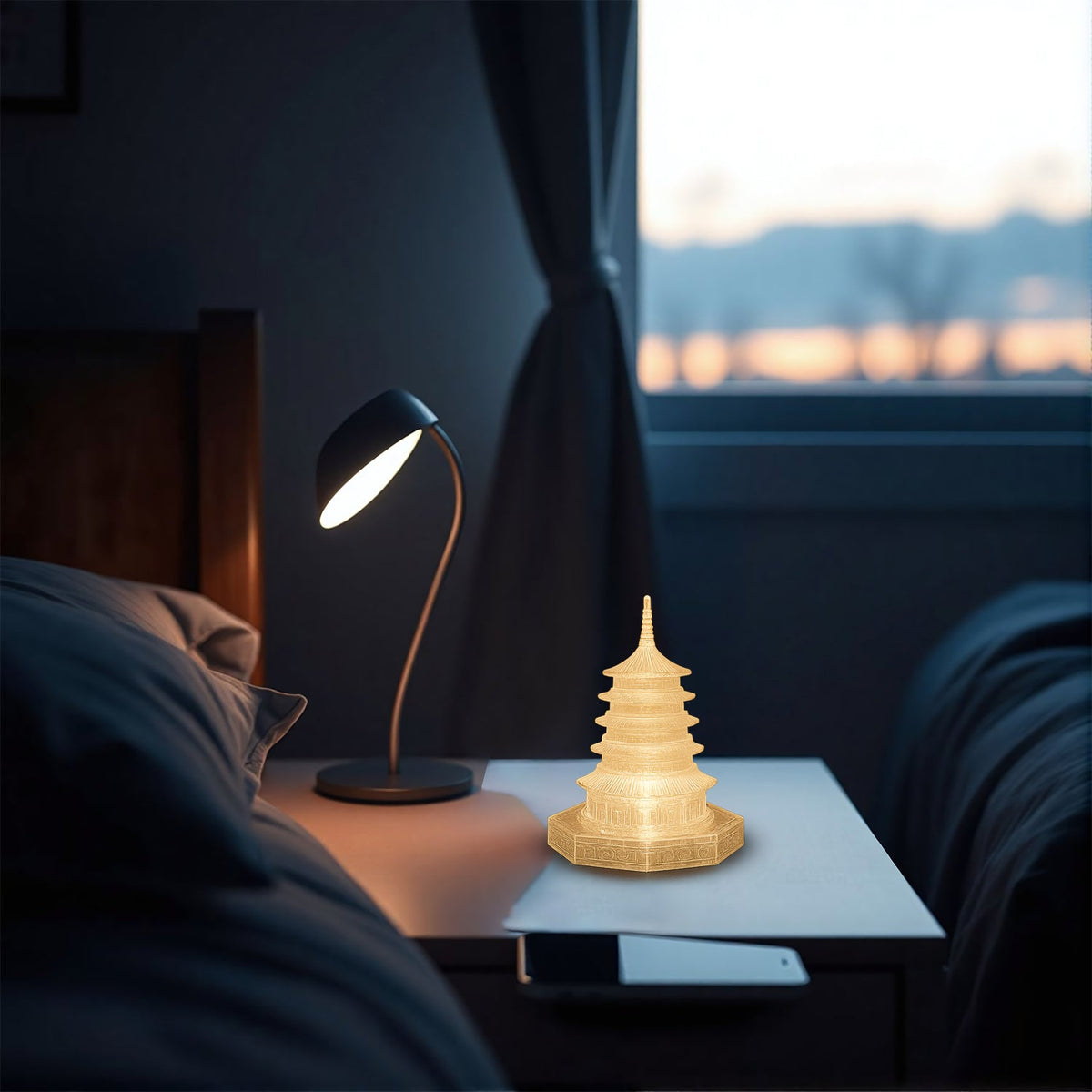 An illuminated LED crystal pagoda light on a bedside table next to a gooseneck lamp in a dimly lit room with a window view.