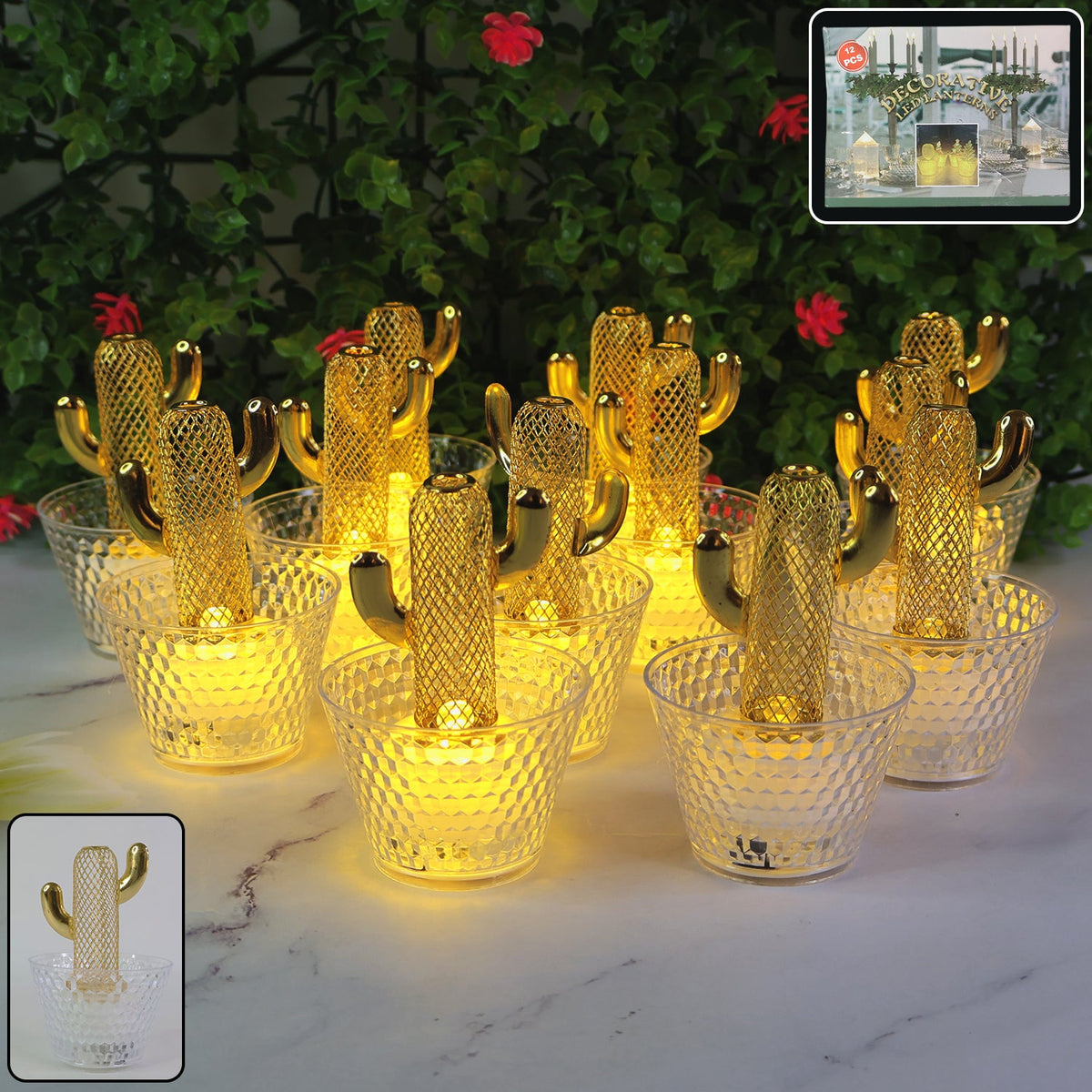 Twelve gold cactus LED tealights with clear textured bases glow warmly on a white surface with green foliage behind.