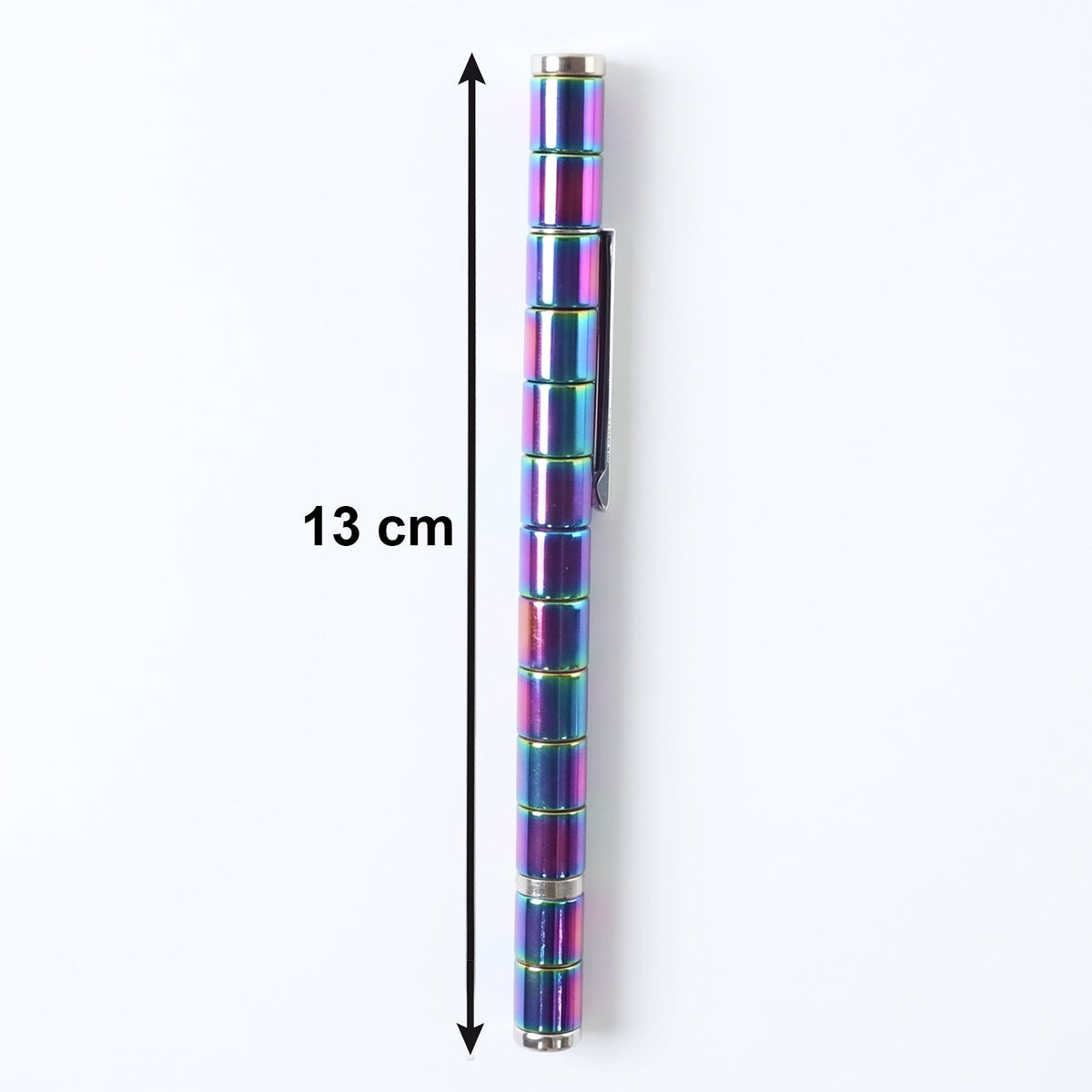 A rainbow-colored magnetic fidget pen with a silver clip is centered vertically on a white background, showing a 13 cm