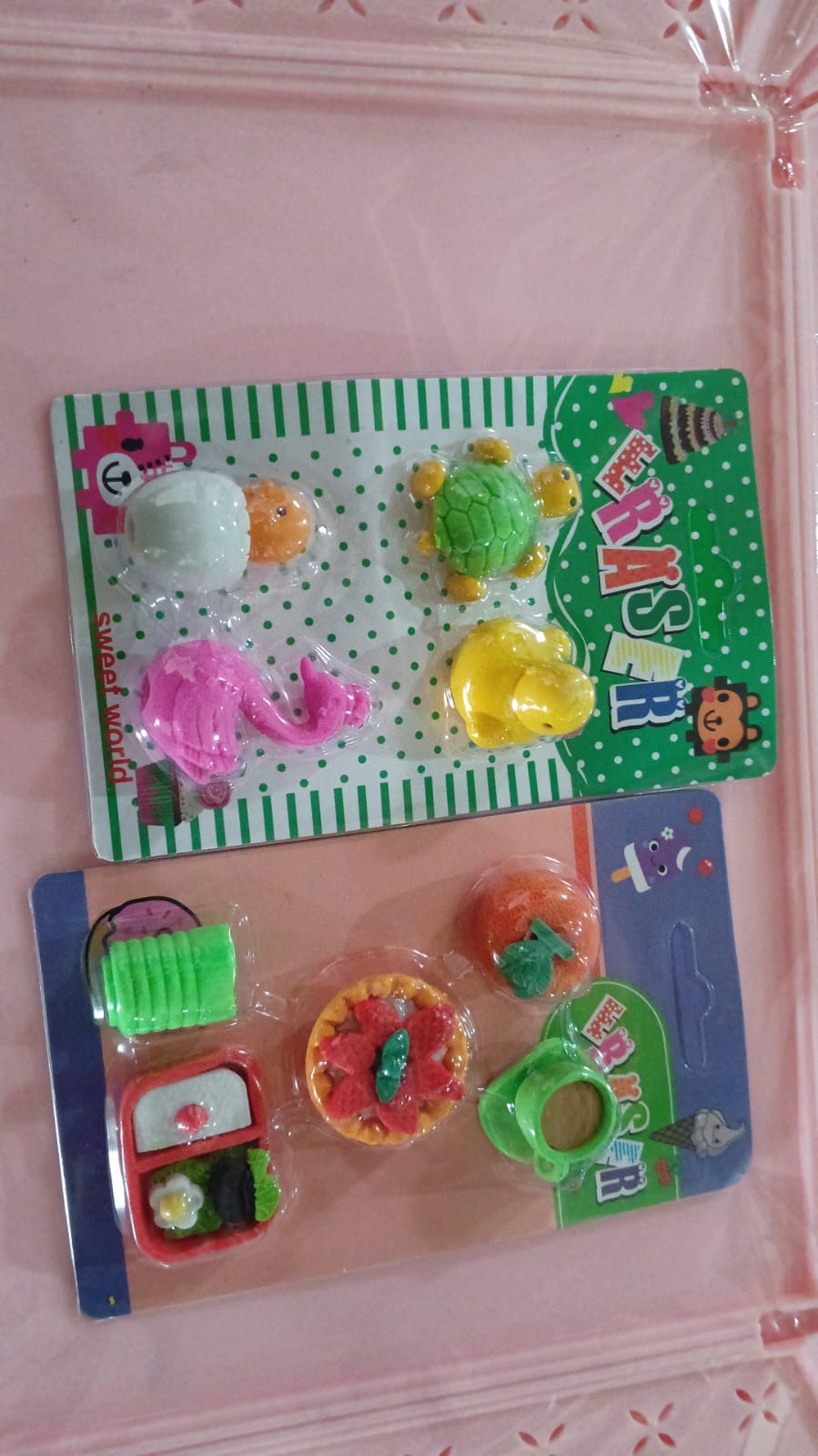 The entire package of 3D erasers, ready to be gifted or used as a delightful addition to any pencil case.
